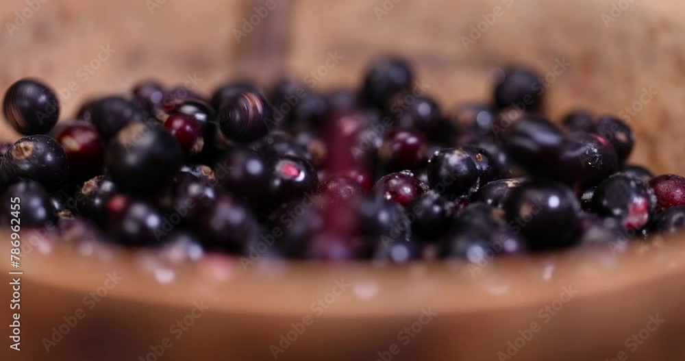 Frozen black currant berries close-up, fresh frozen currants for long-term storage Frozen black currant berries close-up, fresh frozen currants for long-term storage