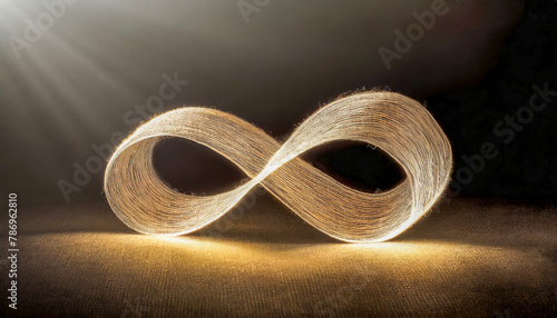 Infinity symbols made of fiber shine in the dark.