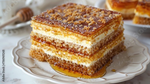Honey cake displayed on a white platter