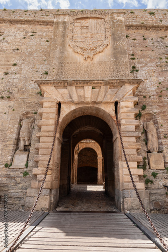 Almudaina Castle entrance in Eivissa  Ibiza  with its drawbridge and heavy chains  stands as a testament to the fortification historical significance and architectural marvel