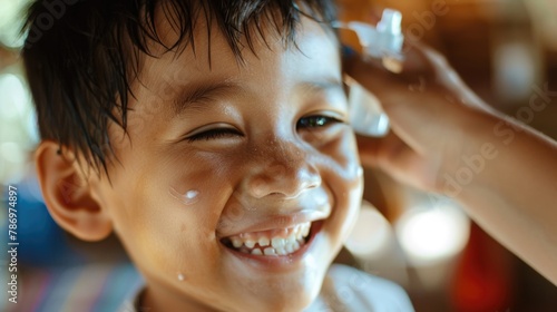 A young boy happily holding a toothbrush, suitable for dental care concept