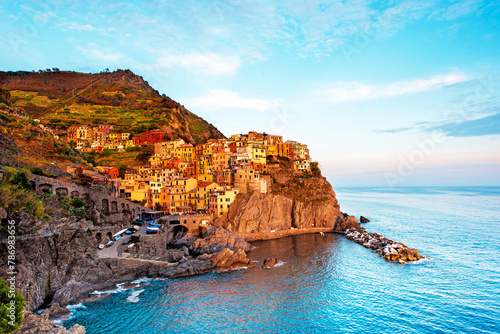 Beautiful magic colorful summer landscape on the coast of Manarola in Cinque Terre, Liguria, Italy at sunset.  Exotic amazing places. Popular tourist atraction. photo