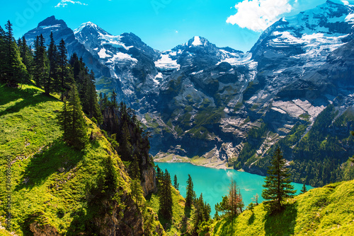 Beautiful magical landscape with the lake Oeschinensee in the Swiss Alps, near Adelboden, Switzerland, Europe