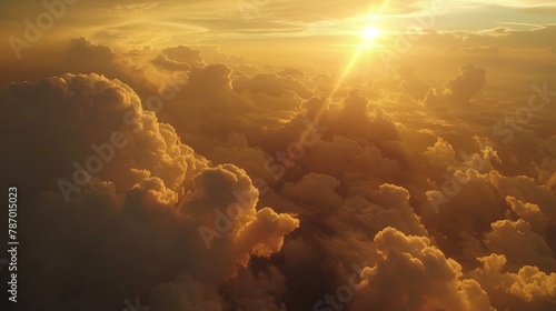 Aerial view of a breathtaking sunset amidst fluffy clouds, showcasing nature's beauty