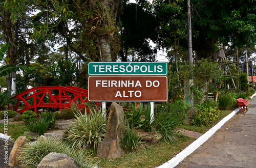 Signboard indicating the location of a traditional crafts fair in Teresopolis, Rio de Janeiro, Brazil