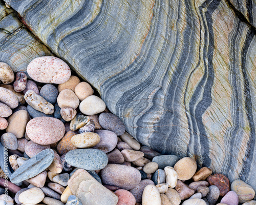 Slate and pebbles, near Kintra, Islay, Argyll, Scotland, UK. November. photo