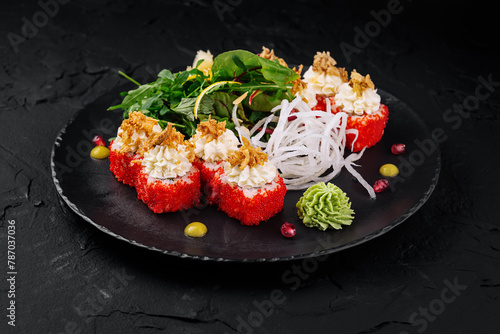 Gourmet sushi platter on black slate