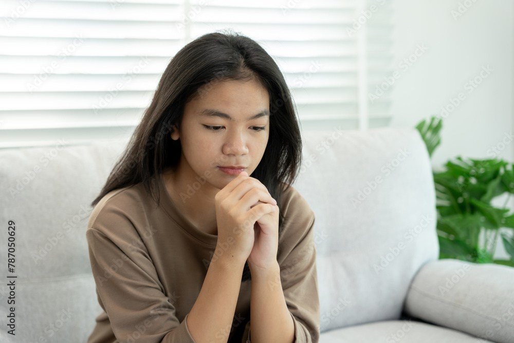Depression and mental illness. Asian woman disappointed, sad after receiving bad news. Stressed girl confused with unhappy problems, arguing with boyfriend, cry and worry about unexpected pregnancy. Depression and mental illness. Asian woman disappointed, sad after receiving bad news. Stressed girl confused with unhappy problems, arguing with boyfriend, cry and worry about unexpected pregnancy.