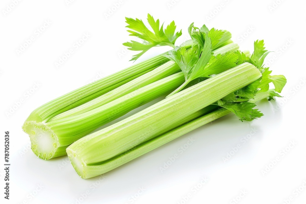 Three fresh celery stalks arranged neatly Three fresh celery stalks arranged neatly