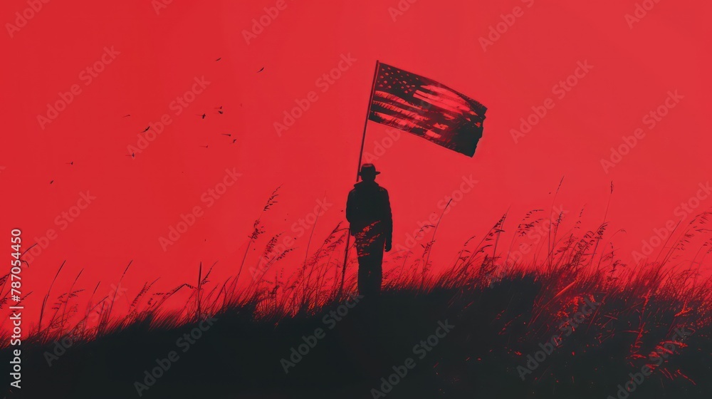 Silhouette of soldier holding American flag