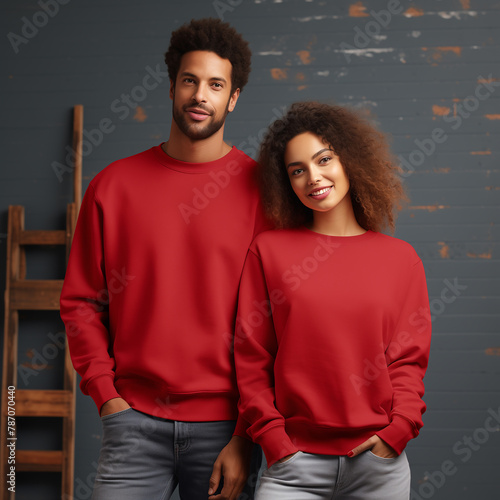 Young woman and man couple mockup. Cherry red sweatshirt on multi ethnic models mockup. Family matching shirt template. Front view of pulover. Husband and wife or girlfriend with boyfriend indoor mock (ID: 787070440)