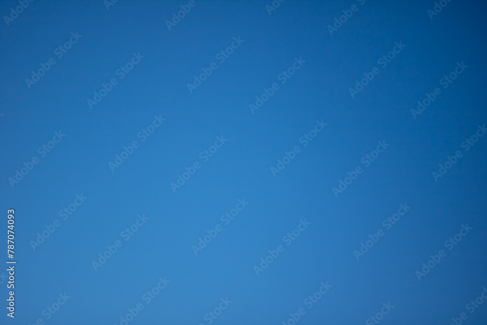 Blurred blue sky at sunset, graphient background Blurred blue sky at sunset, graphient background