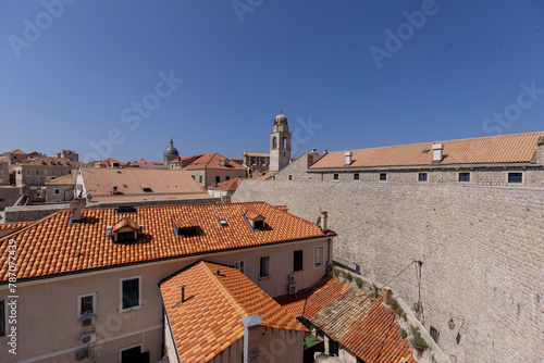 City Walls with Clock tower, surrounding medieval city on the Adriatic Sea, Dubrovnik, Croatia photo