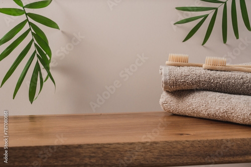 Wooden shelf podium with towels for the presentation of cosmetic products. Beauty products, morning routine
