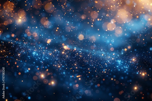 Beautiful image of blue particles and golden bokeh light giving illusion of a stargazing night with magical feel photo