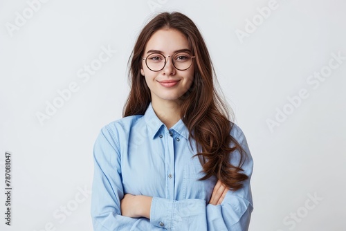 Photo of cheerful self-assured lady folded arms wear eyeglasses blue shirt isolated . photo on white isolated background