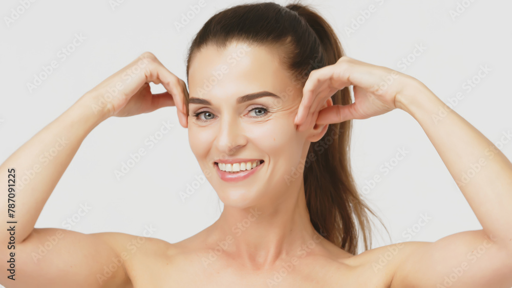 Happy mature middle-aged woman touching face and looking at camera. Healthy, dry skin care concept, cosmetics and anti-aging plastic surgery. Happy mature middle-aged woman touching face and looking at camera. Healthy, dry skin care concept, cosmetics and anti-aging plastic surgery.