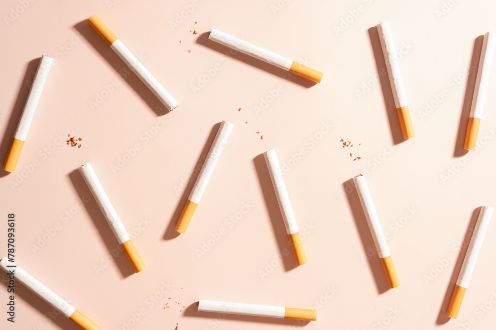World no tobacco day concept template. Flat layout of cigarettes or tobacco on brown background. World no tobacco day concept template. Flat layout of cigarettes or tobacco on brown background.