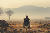 A person in a wheelchair navigating a dirt road with determination and independence