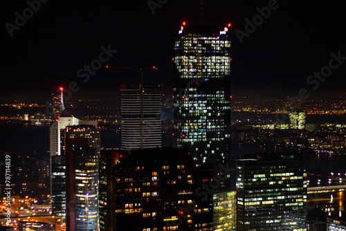 The DC Tower (also known as Donau City Tower) is the tallest skyscraper in Austria at 220 metres high, situated in the district Donaustadt as seen from the Danube Tower, Vienna, Austria photo