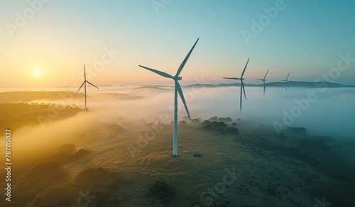 Aerial View of Foggy Hill Wind Turbines Generating Clean Energy in the Middle of a Field