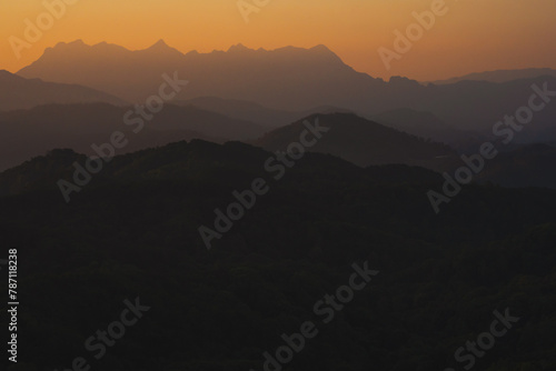 Wallpaper Mural nature traveling with orange sky and layer of mountain with sunrise background Torontodigital.ca