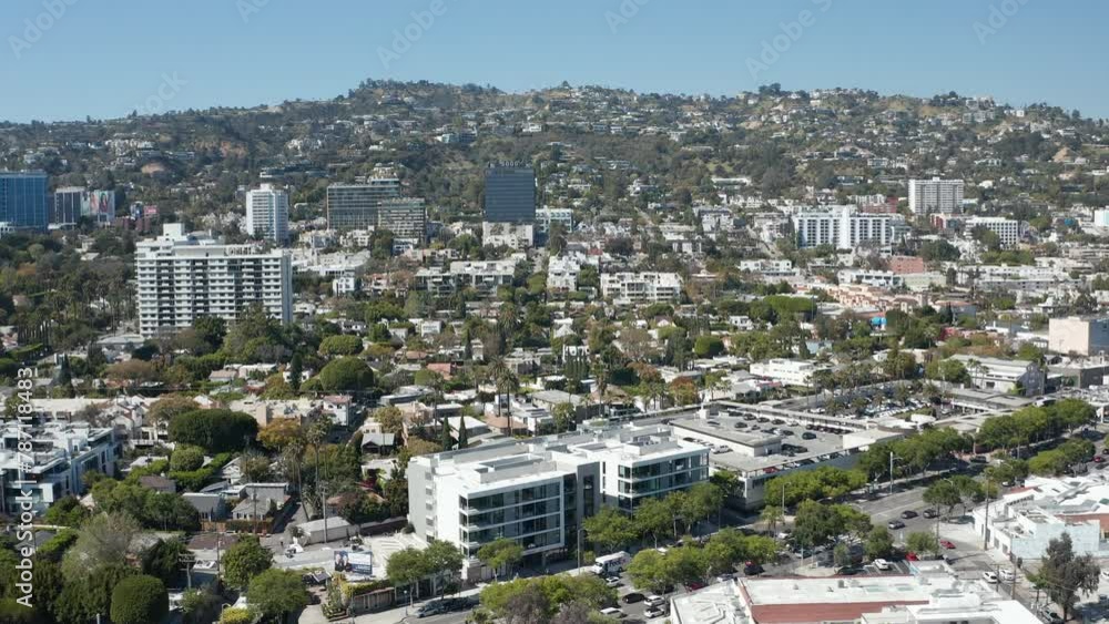 Aerial shot of Beverly Hills condos, aprtments, homes, shops, palm trees Aerial shot of Beverly Hills condos, aprtments, homes, shops, palm trees