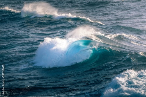 Crashing wave with blue light. Sun light ocean