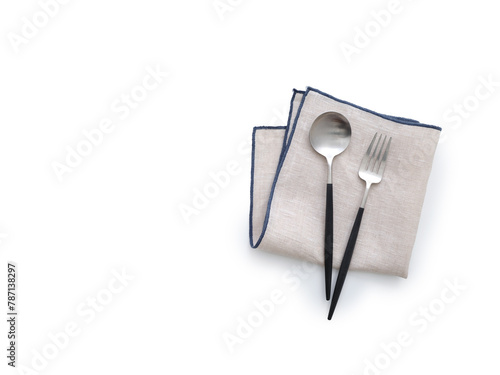 Flat lay with linen kitchen napkin isolated on white background. Folded cloth for mockup