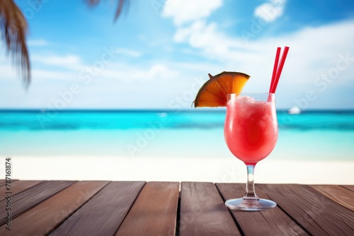 fresh red cocktail on tropical beach in summer