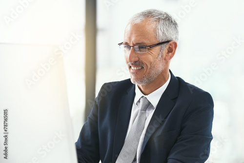 Computer, glasses and mature businessman in office for web, research and b2b, client or communication. Pc, review and CEO reading company newsletter, planning or checking email, schedule or feedback