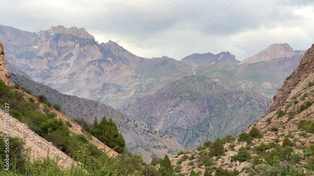 Mountain landscape of the Fan Mountains on a sunny summer day, Tajikistan, Central Asia. Fan Mountains in the heart of Tajikistan. 4K Mountain landscape of the Fan Mountains on a sunny summer day, Tajikistan, Central Asia. Fan Mountains in the heart of Tajikistan. 4K