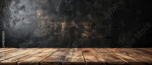A blank wooden tabletop set against a black board wall background, creating a sleek and professional mockup and display space for various products