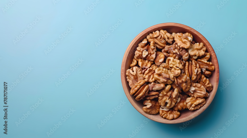 Walnut kernel halves in a wooden bowl Closeup from above on colored background Healthy eating Walnut concept Super foods with copy space : Generative AI Walnut kernel halves in a wooden bowl Closeup from above on colored background Healthy eating Walnut concept Super foods with copy space : Generative AI