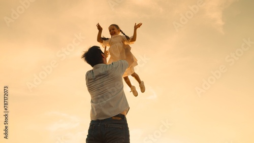 father throws child kid daughter into sky, silhouette happy family, children dream flying airplane pilot, child and dad play, kid air toss, joyful child, playful moments, daddy's girl flying, child up