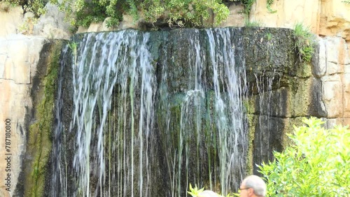 fastest waterfall falls from stone cliffs photo