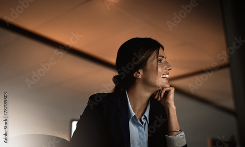 Business woman, smile and monitor in office for night shift, online digital report or web project in career. Professional editor and happy with tech for email, research and deadlines on computer