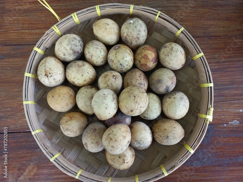 Lansium parasiticum on basket photo