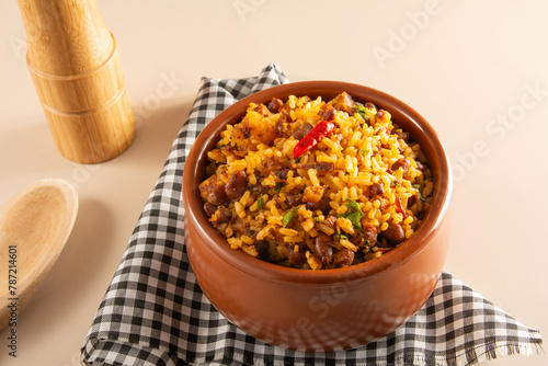 Baião de Dois traditional Brazilian food with rice, beans, sausage and rennet cheese photo