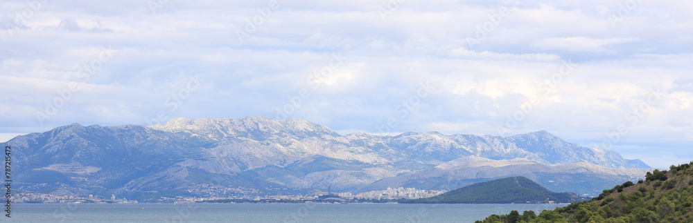 Picturesque mountains and sea under beautiful sky, banner design