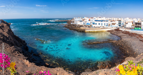 Panoramic view of the fishing coastal town El Cotillo in the municipality of la Oliva and the blue natual lagoon in Fuerteventura -  Province of Las Palmas, Canary Islands, Spain © cristianbalate