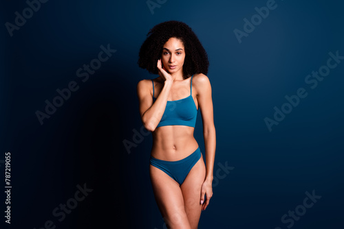 No filter photo of adorable shiny lady underwear lingerie accept stretch marks skin empty space isolated blue color background © deagreez