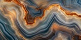 Close-up of swirling patterns and bands in earth-toned agate stone, depicting geological beauty and natural art