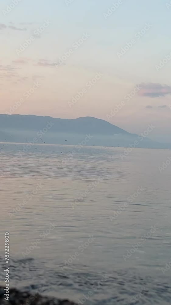 Lake Turin on the border of Macedonia and Albania Clear water sunrise or sunset blue sky Lake Turin on the border of Macedonia and Albania Clear water sunrise or sunset blue sky