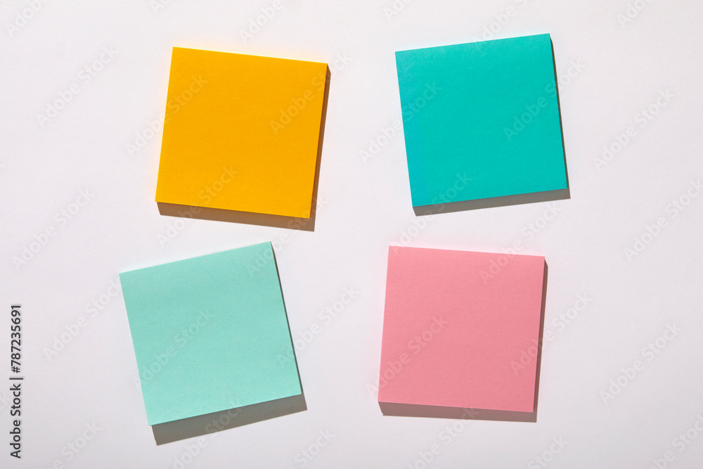 Colorful blank adhesive notes on white background Colorful blank adhesive notes on white background