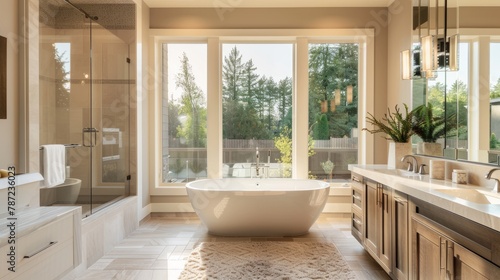 A panoramic view of a large bathroom featuring a bathtub and two sinks, showcasing seamless design and functionality © Ilia Nesolenyi