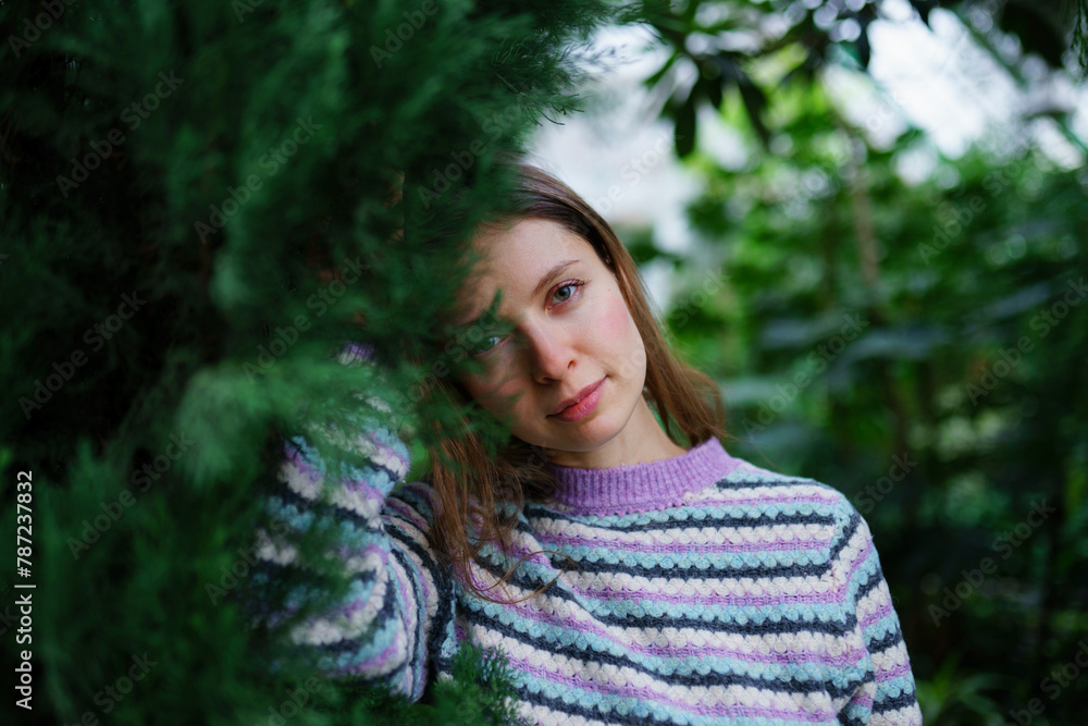 Portrait of woman standing in greenhouse Portrait of woman standing in greenhouse