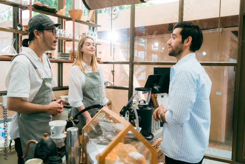 barista talking with custom...