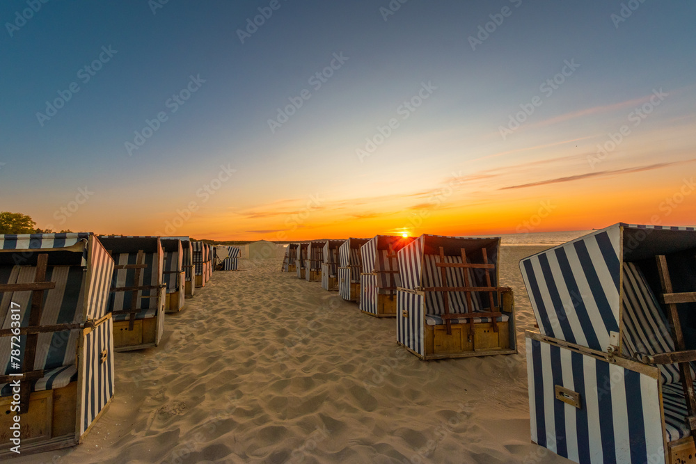 Strandkorb on the Polish Baltic Sea during the sunset Strandkorb on the Polish Baltic Sea during the sunset