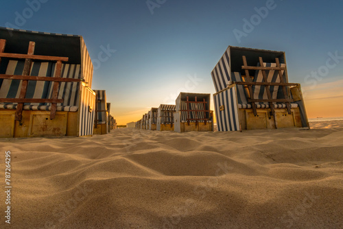 Strandkorb on the Polish Baltic Sea during the sunset photo